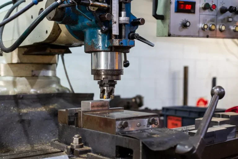 Detail of a CNC machine customising a part